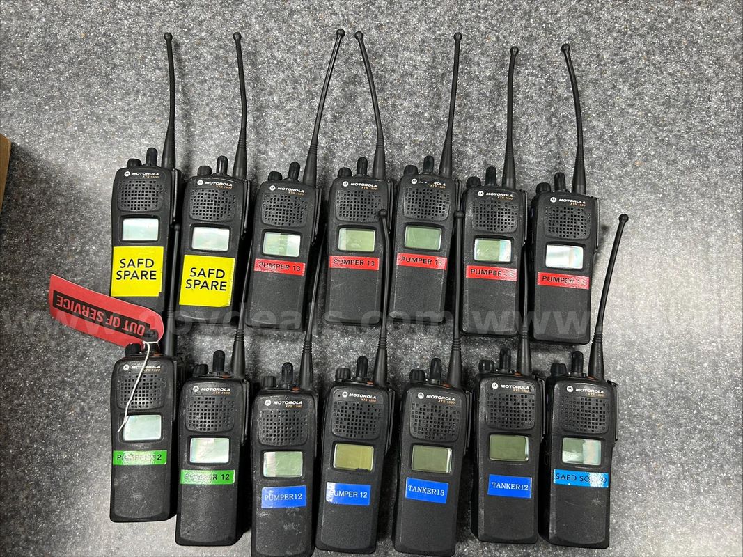 Lot of 14 Motorola XTS 1500 radios, lot includes remote mics, spare antennas, chargers, batteries