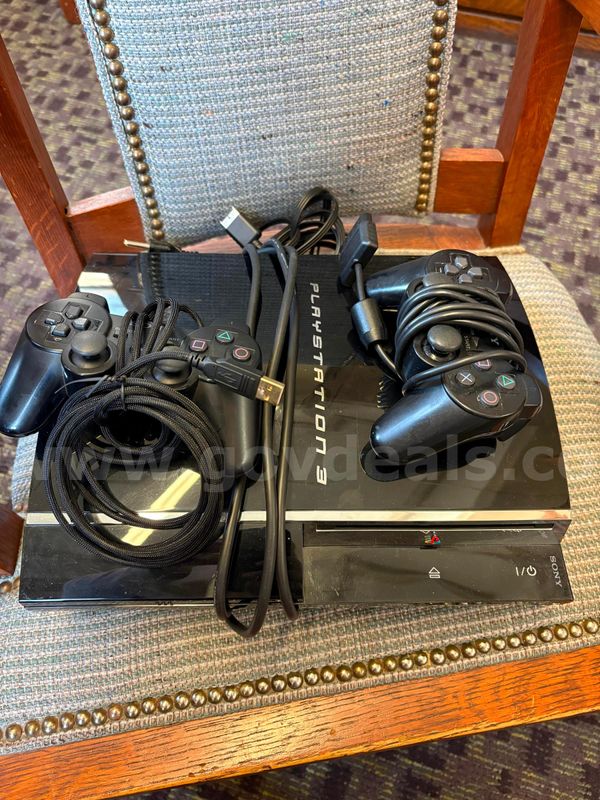 Playstation 3 unit plus two controllers