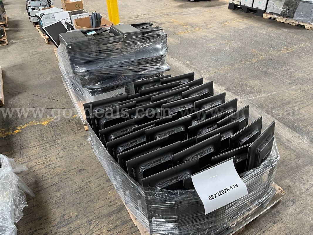 Lot of monitors, printers and office supplies