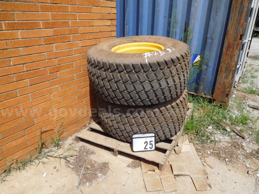 TWO (2) TITAN MULTI TRAC TIRES 44X18.00-20 MOUNTED ON WHEELS