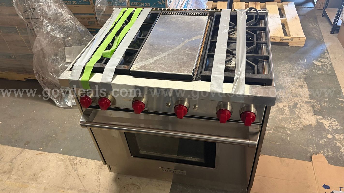 36" WOLF STOVE. WAS WORKING AT TIME OF DISCONNECTION. DIMENSIONS ARE: 36"WIDTH x 28"LENGTH x 37"HEIGHT