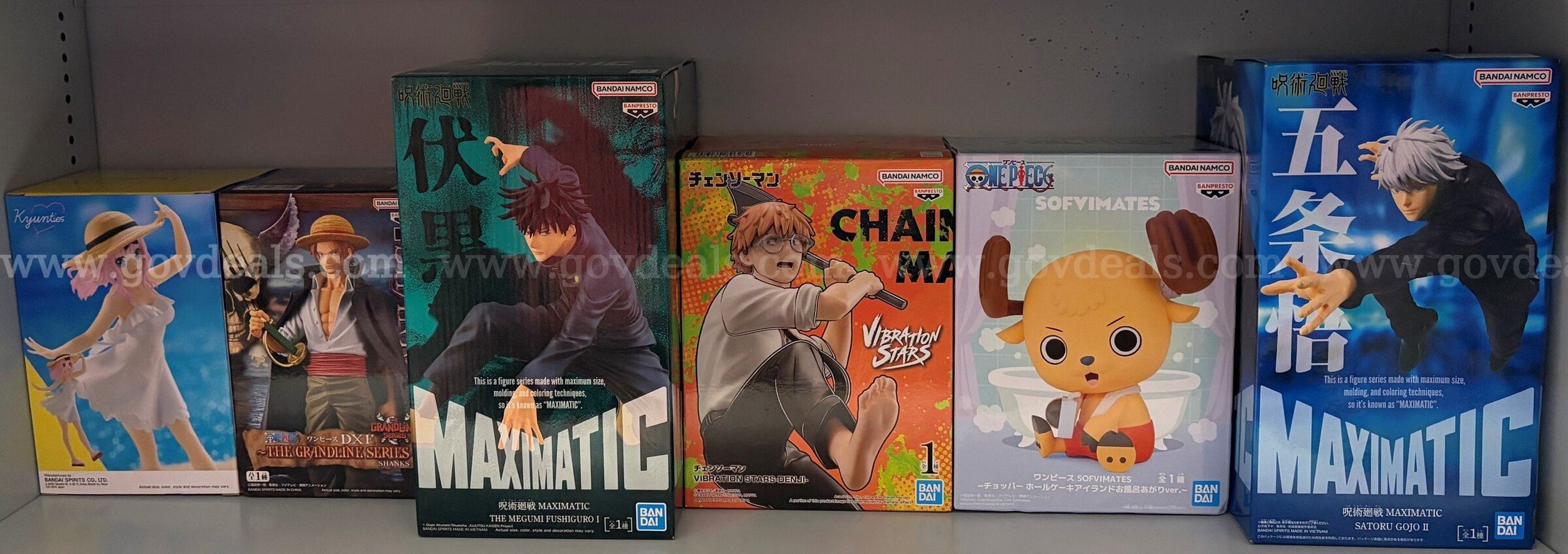 Lot of anime collectible figures from popular franchises like Jujutsu Kaisen, One Piece, Chainsaw Man, and Demo Slayer.