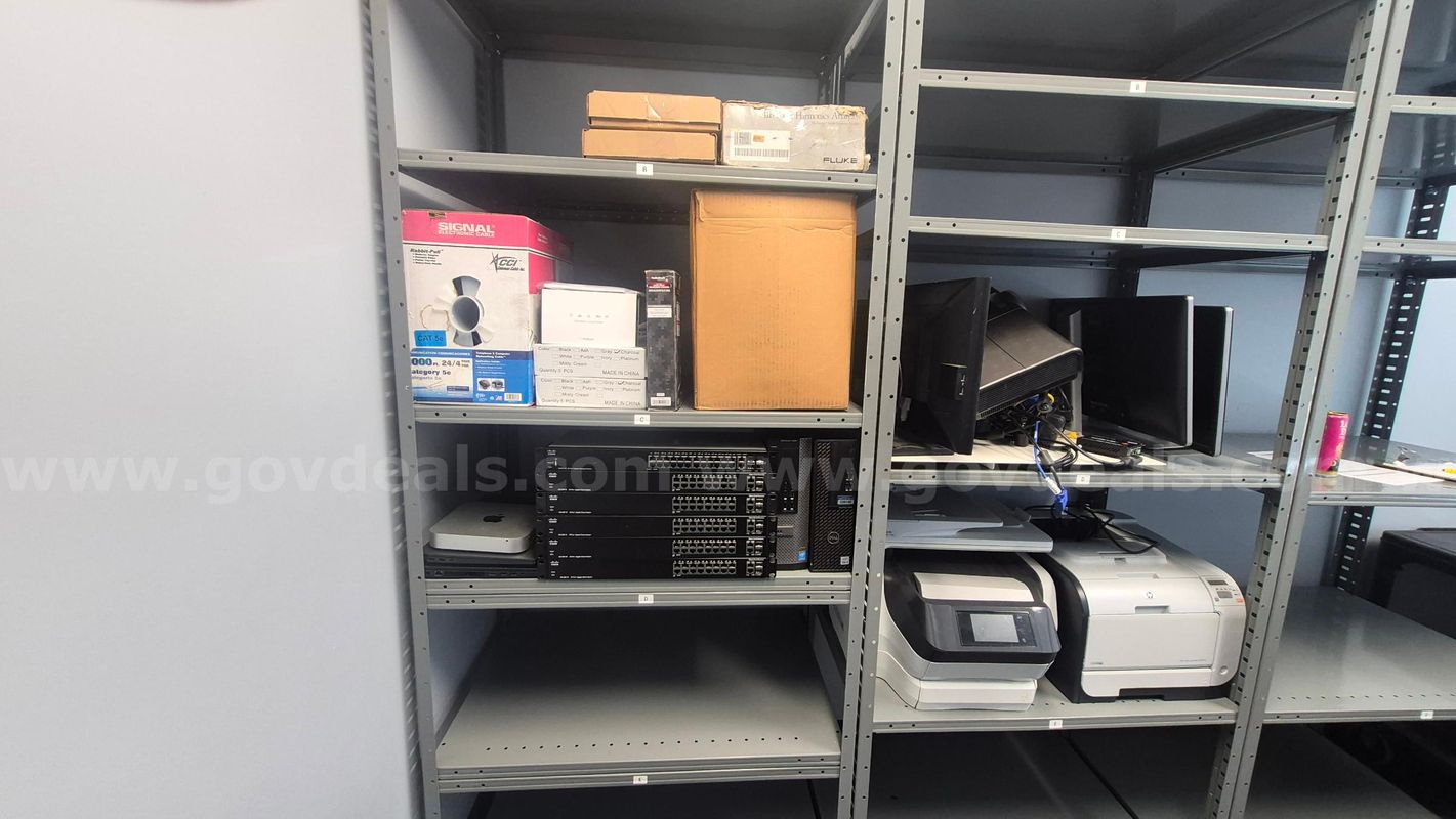 (6) Cisco Switches, (2) Dell Laptops, (2) Dell Optiplex PCs, (3) Dell Monitors, Optoma Projector, misc computer equipt