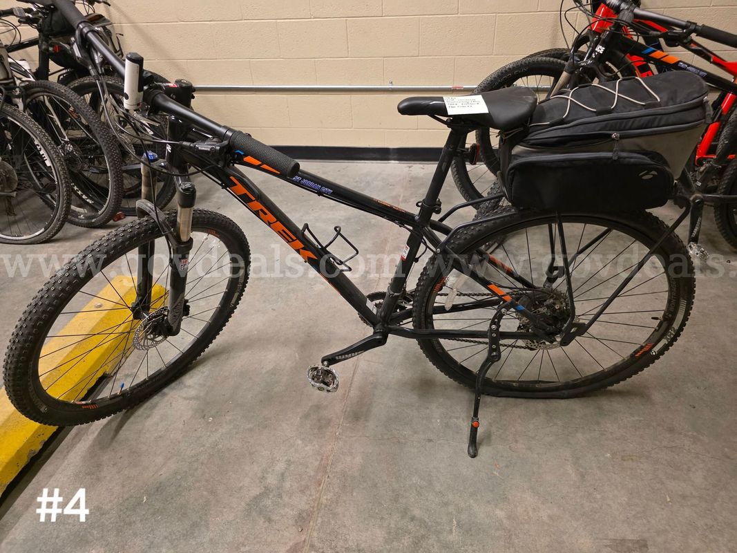 Used black Trek Xcaliber8 bike. Bike tires are flat.