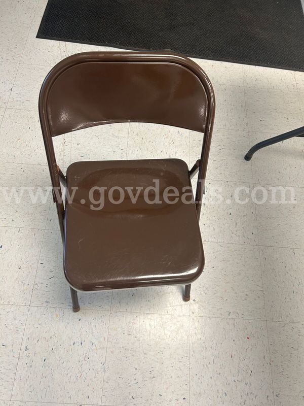 45 - Brown folding chairs