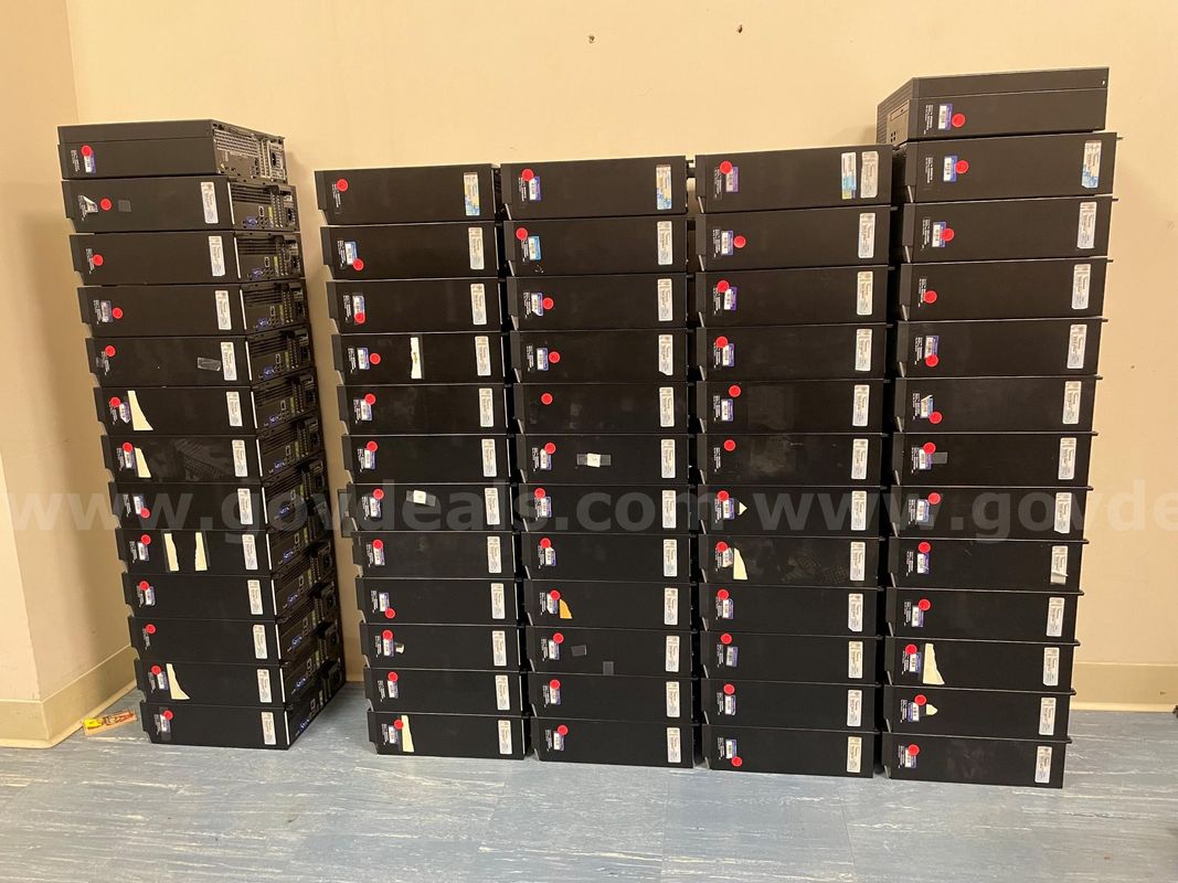 Lot of computer workstations, and keyboards - Used