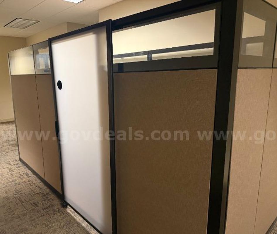 Cubicle with a Sit Stand Desk and Two Drawer Filing Cabinet