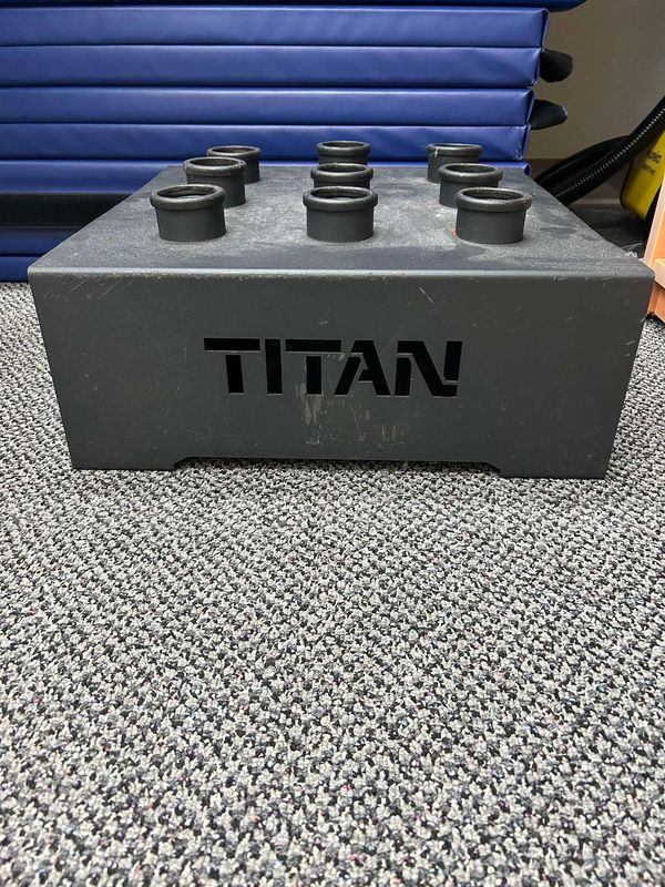 Titan barbell holder