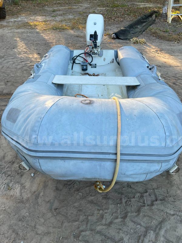 Avon 9' inflatable with a 2006 Johnson 15hp BRP