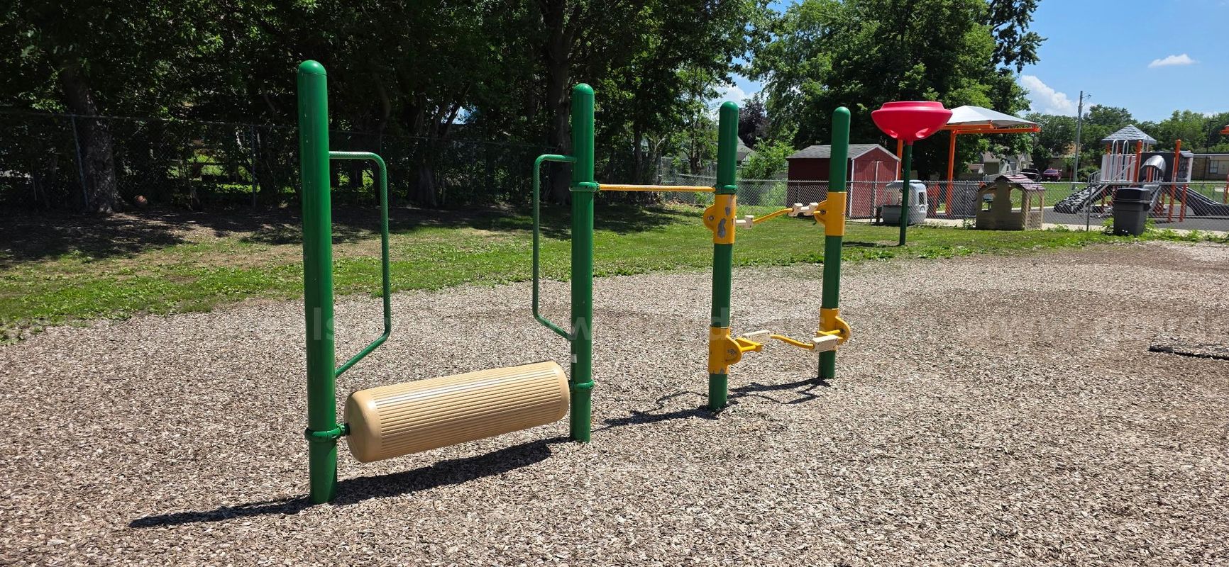 Playground rolling log and ski walker