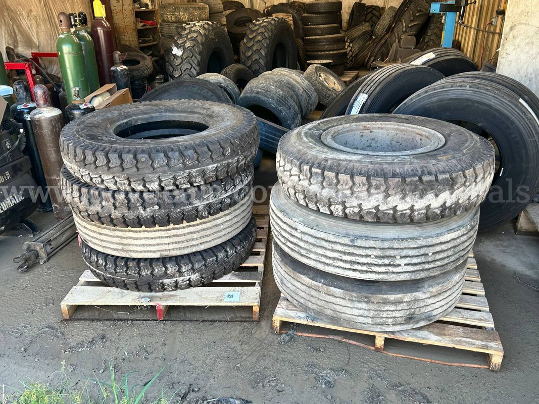 1 Lot of (7) NEW and USED Tires - Nutech N500 10.00-20 14-Ply Heavy Duty Tires with Rims