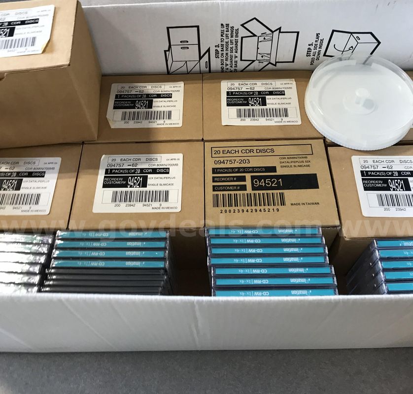 a box of new writable CD's. (S2)