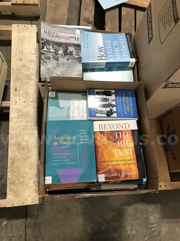 Used pallet of library educational books. (S2)