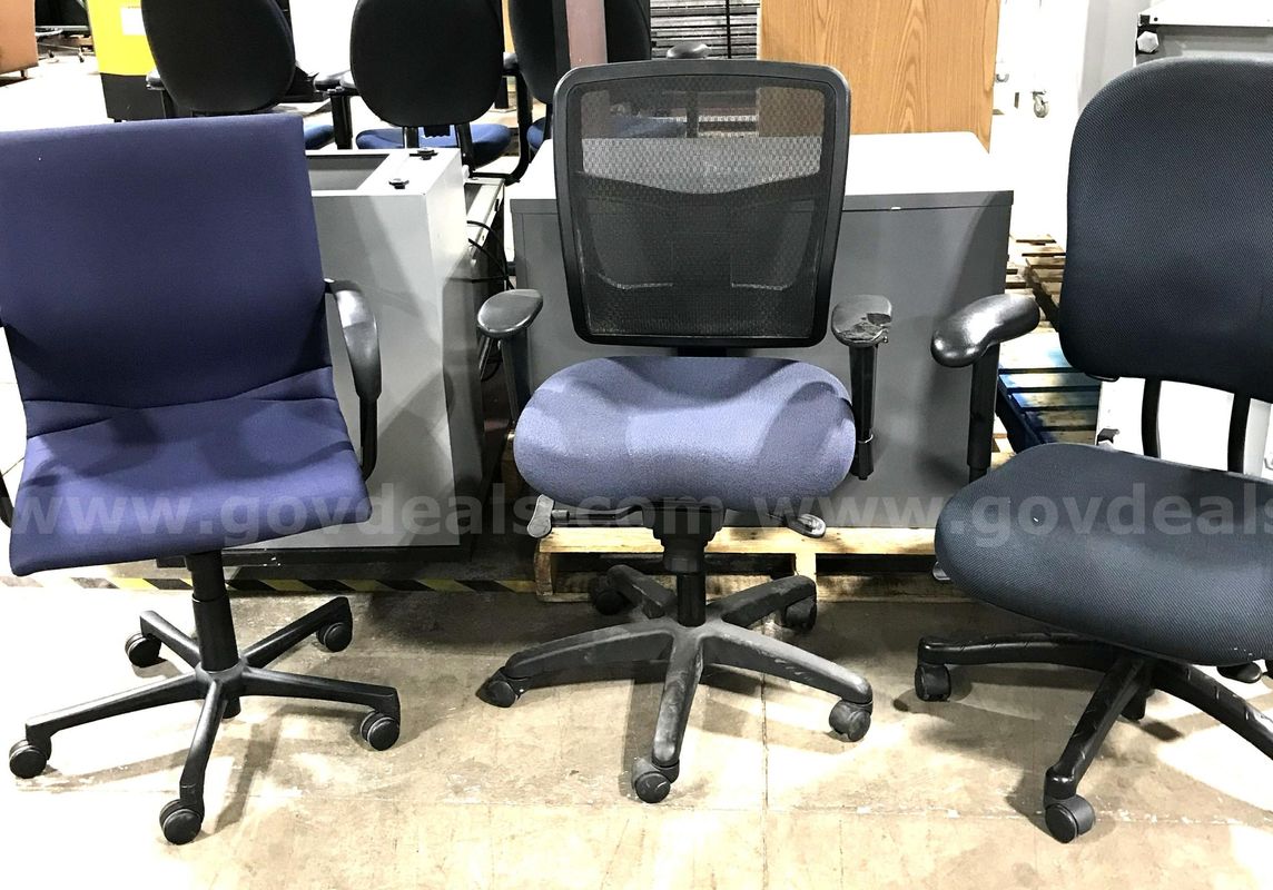3 used blue office chairs.