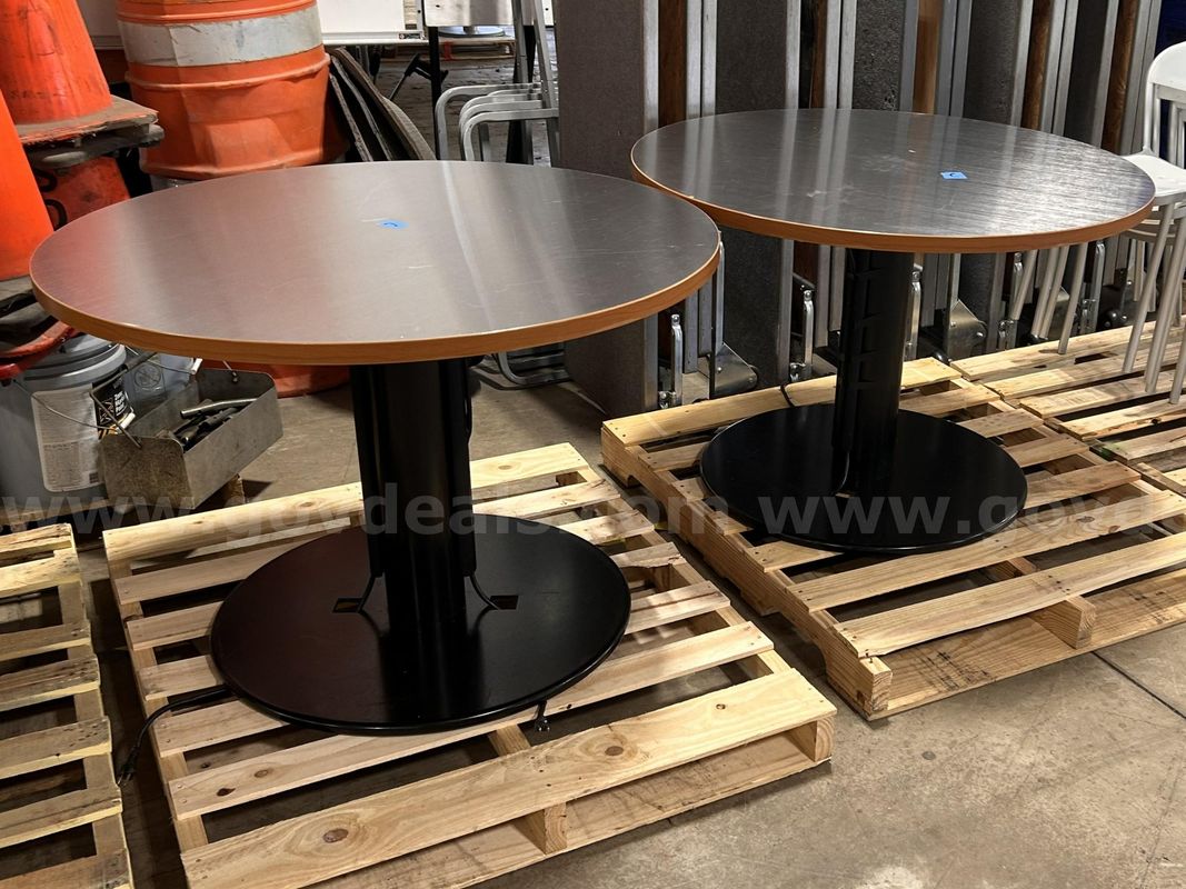 2 Used Round Pedestal Tables with electrical outlets. (S2)