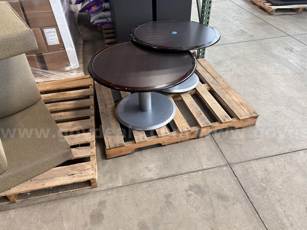 2 Used Short Round Pedestal Tables