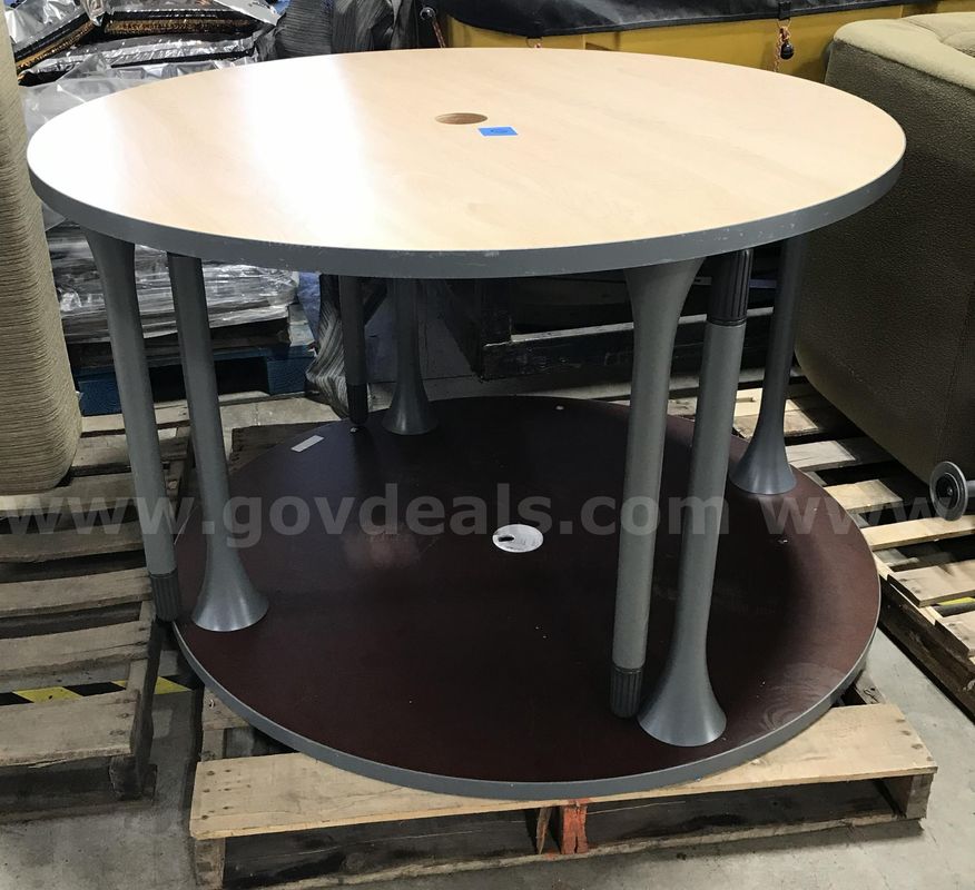2 used 4ft round tables with legs. (S1)