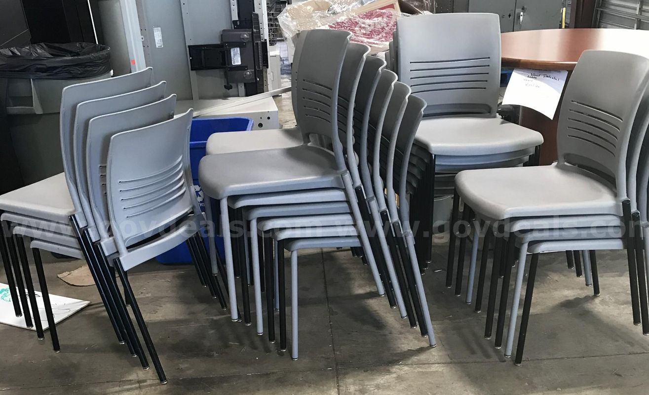 23 used stackable chairs. (s1)