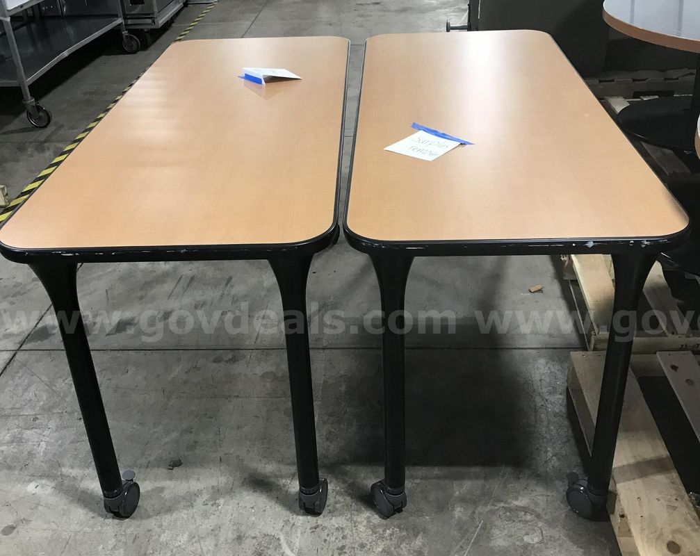 2 used rolling tables. (S1)