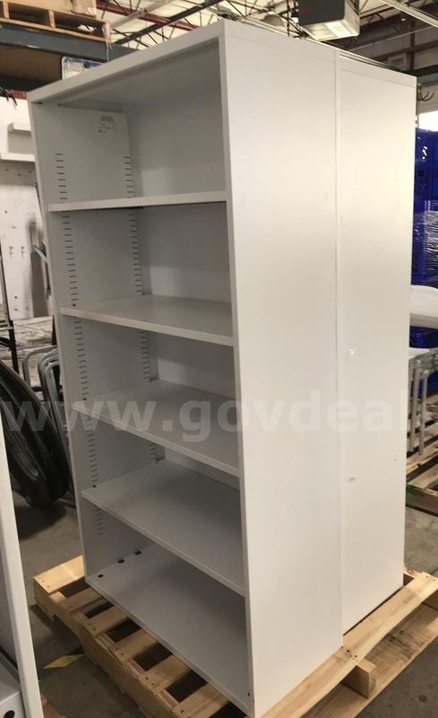 2 used white bookshelves. (S2)