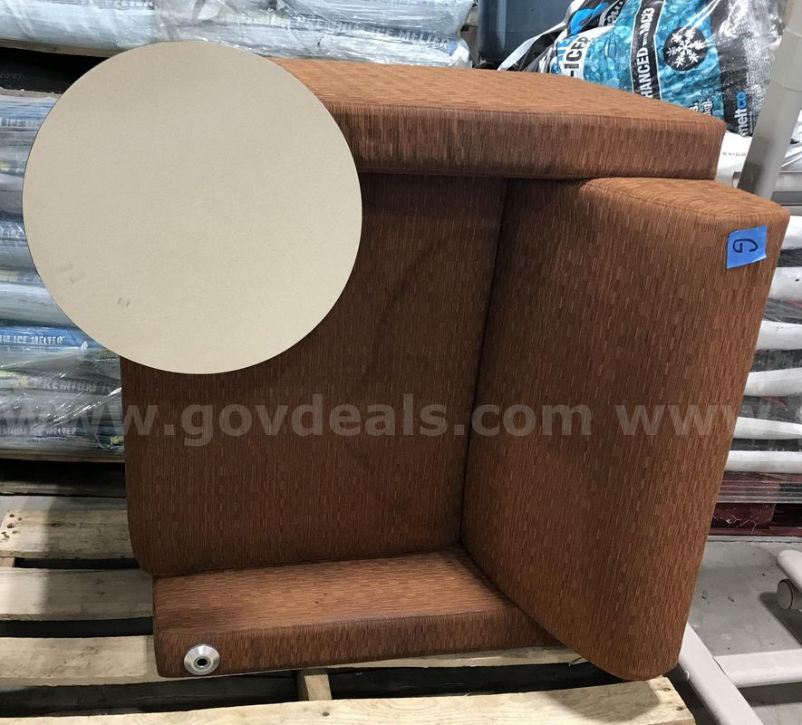 Used orange chair with built in table. (S2)