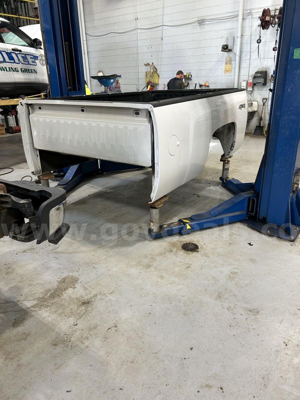 2013 Used Chevy White Truck Bed - Start Bid $50.00 - Public Works 815 E. Poe Rd. 419-409-0087