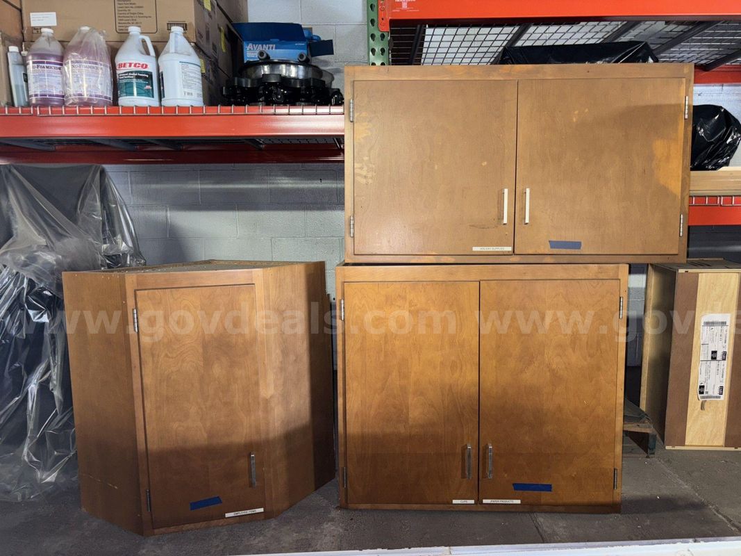 Wood Cabinets - Start Bid $1.00 - Public Works 419-409-0087 1010 North College Dr.