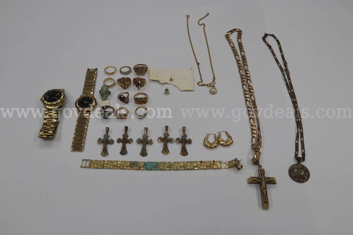Assorted yellow and silver colored jewelry