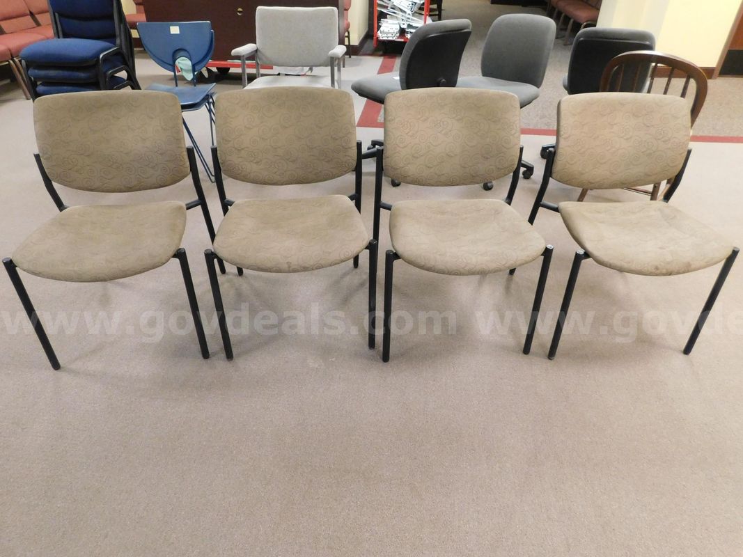 4 Tan Stackable Chairs