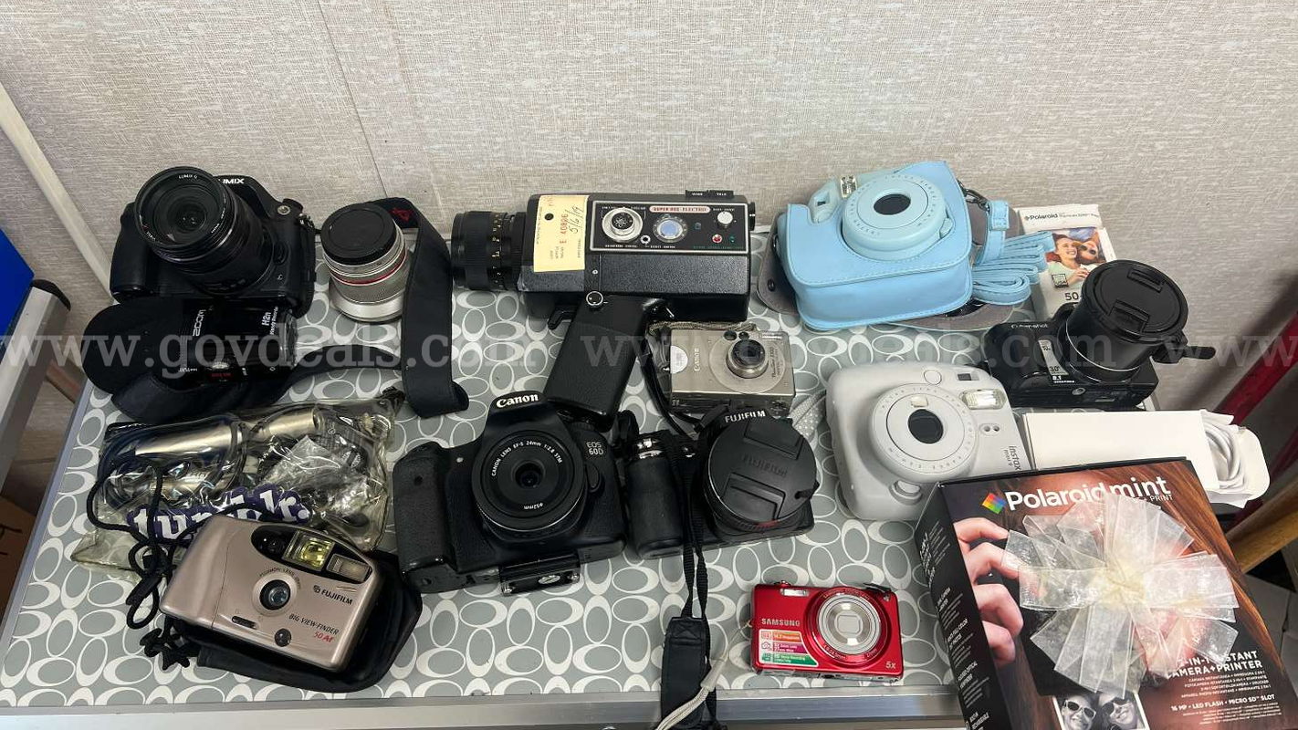 Lot of (25) Various Cameras and Camera Accessories