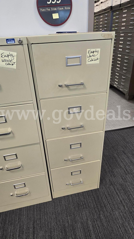 Tan Colored 4 Drawer Filing Cabinet - Used