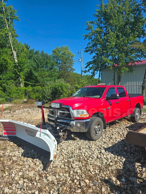 2011 Dodge Ram 2500 with a snow plow and salt spreader.