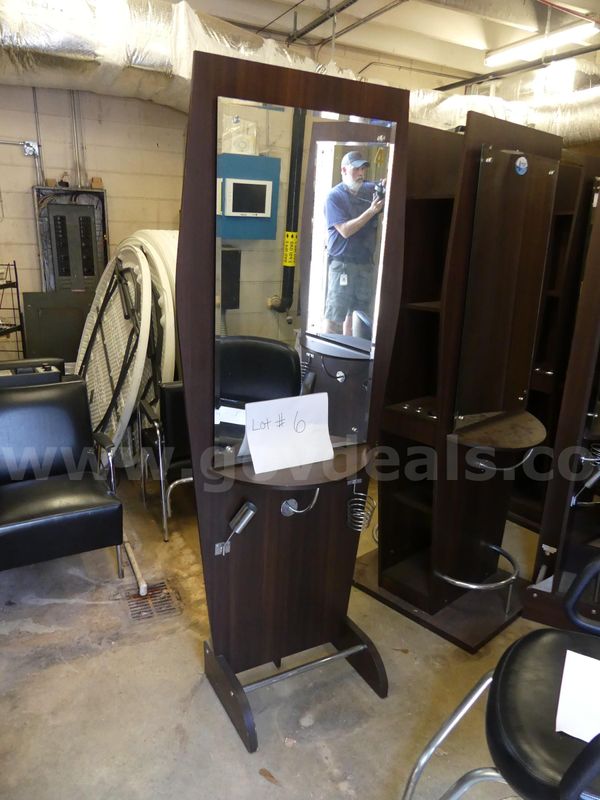 Single salon station with mirror and adjustable barber chair. SOLD-AS-IS