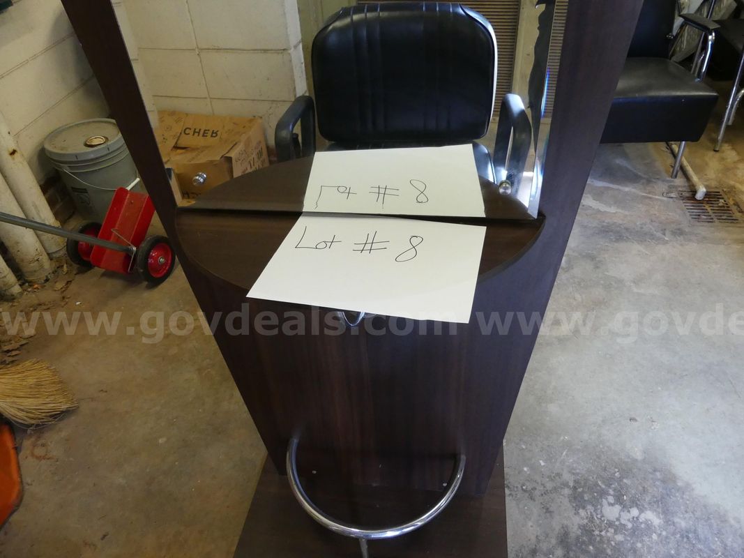 Double salon station with mirror and adjustable barber chair. SOLD-AS-IS