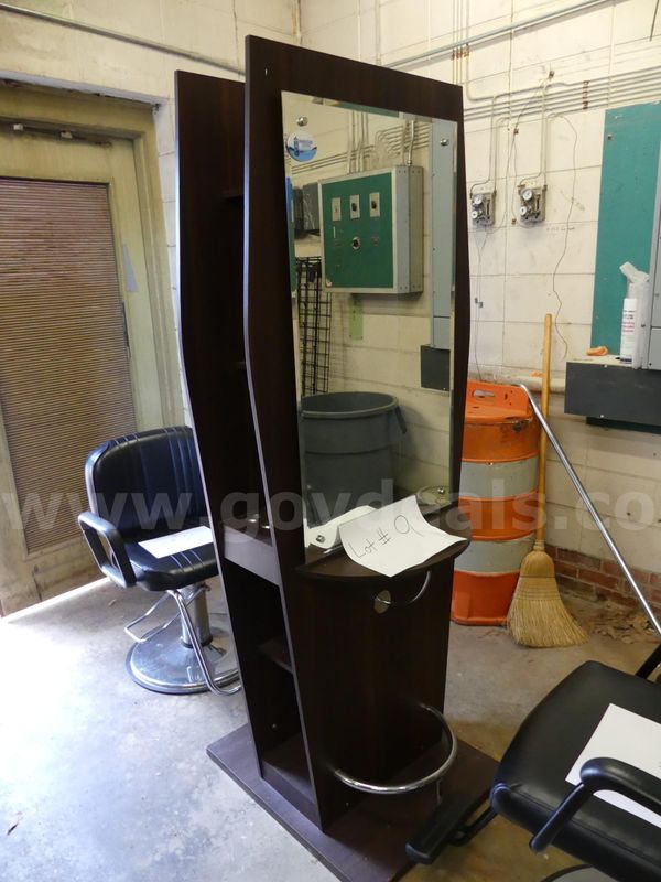 Double salon station with mirror and adjustable barber chair. SOLD-AS-IS
