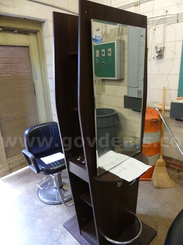 Double salon station with mirror and adjustable barber chair. SOLD-AS-IS