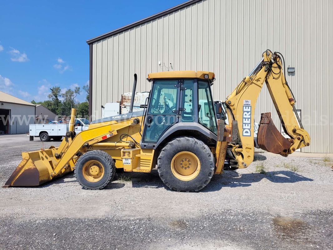 John Deere 310 SG Backhoe. Starts. Runs. Needs repair.