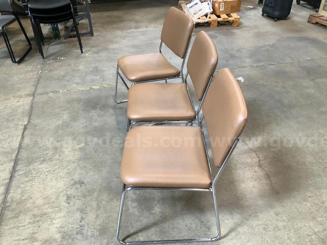 3 stackable Chairs Brown Faux leather