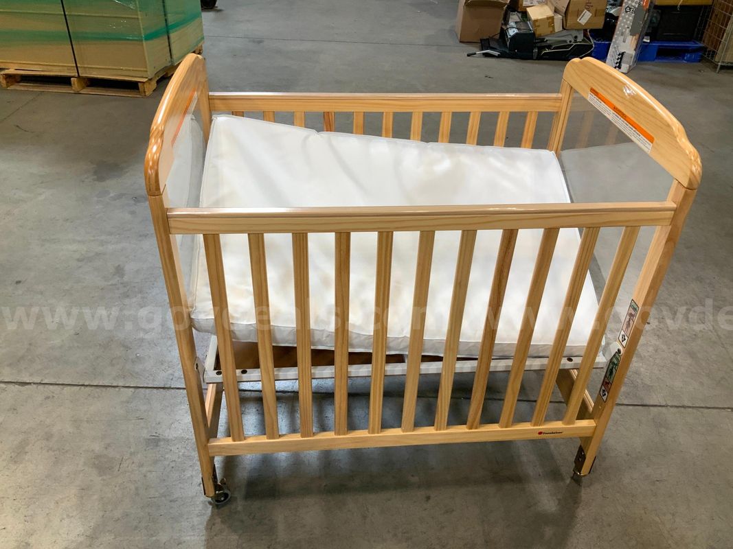 New Crib on wheels with mattress