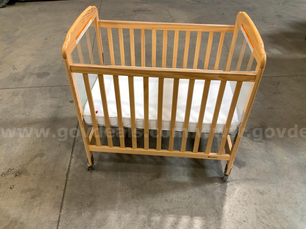 New Crib on wheels with mattress