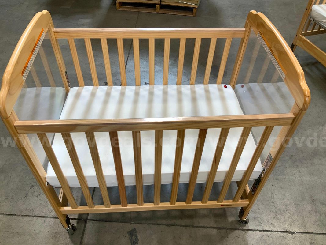 New Crib on wheels with mattress