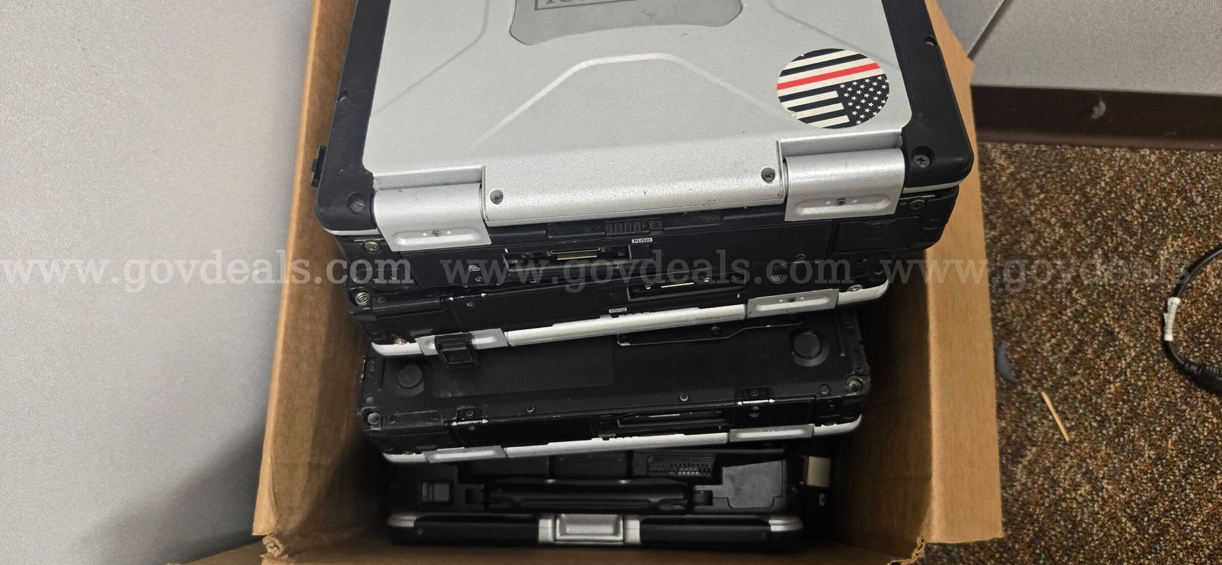 Lot (13) Panasonic Toughbook CF-31 Computers and (7) Havis Docking Stations