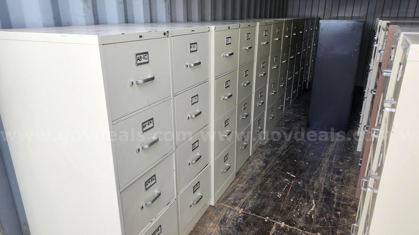 Qty 28 metal filing cabinets (Stored Outside, As-Is) - Buyer Responsible For Loading