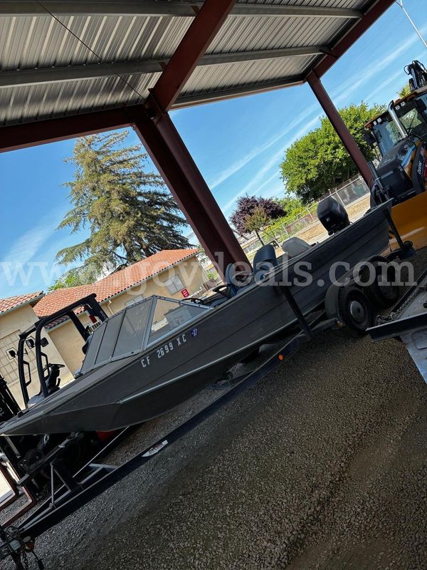 21' Gregor Aluminum boat, evinrude 70hp OB with trailer