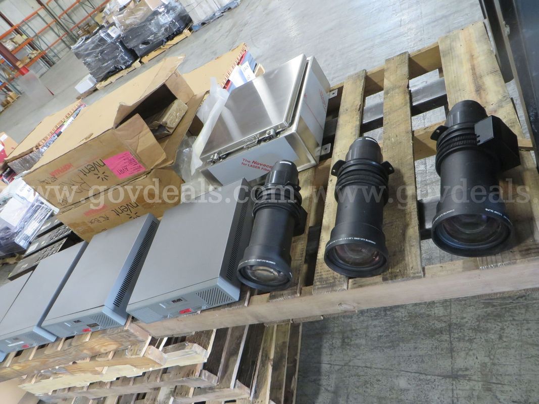 1 pallet Telescopic lenses, Surge adapters and more