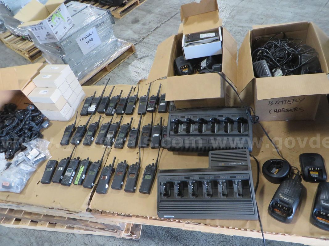 4 boxes Hand-Held radios (29 radios total), chargers, microphones and more