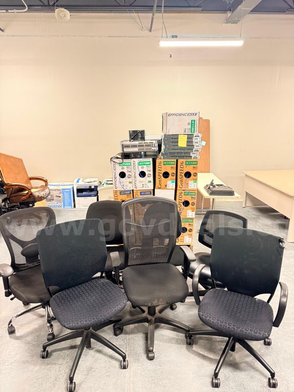 Set of 7 Miscellaneous Black Rolling Office Chairs