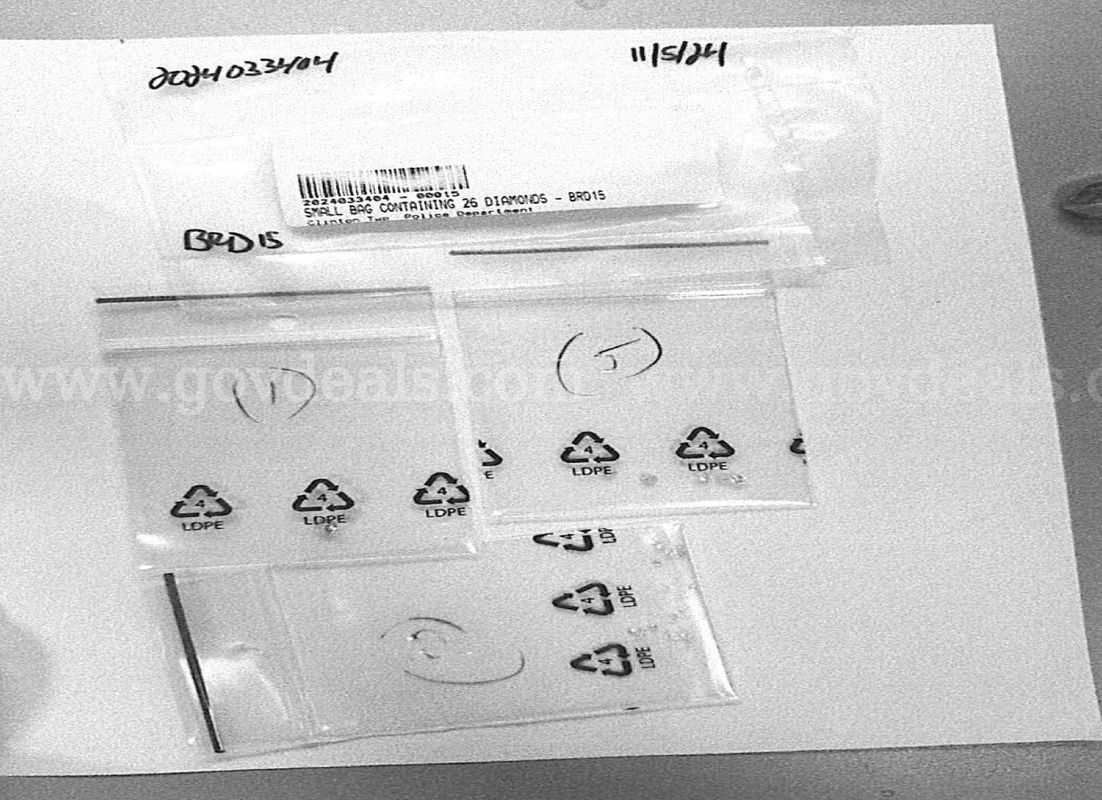 Small Bag Containing 26 Diamonds