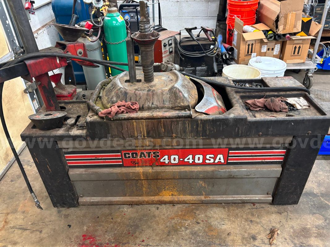 Tire changing machine and balancer
