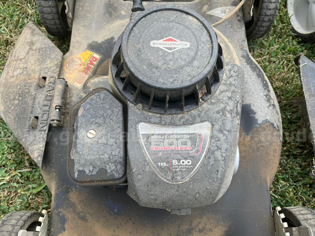 Two Push Mowers